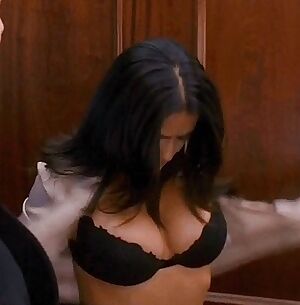 Salma Hayek laying out the plot