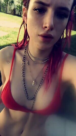 Showing off in A small red bikini