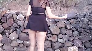 Wife climbing over the wall next to the highway to have sex.