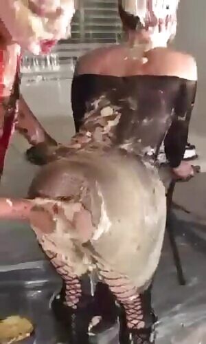 Pornstar Olivia Wilder covered in dessert, playing with her partner