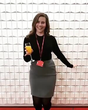 Having fun in her pencil skirt