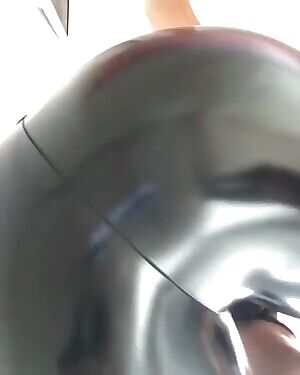 Shiny leggings facesitting