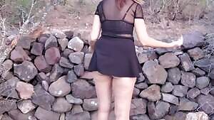 Wife climbing over the roadside wall to have sex while looking out on the highway.