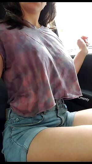 Playing with my titties in the car 😁 In the mood for some roadhead?