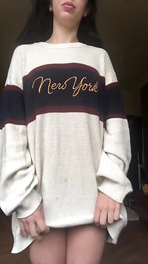 What is hidden under the sweater